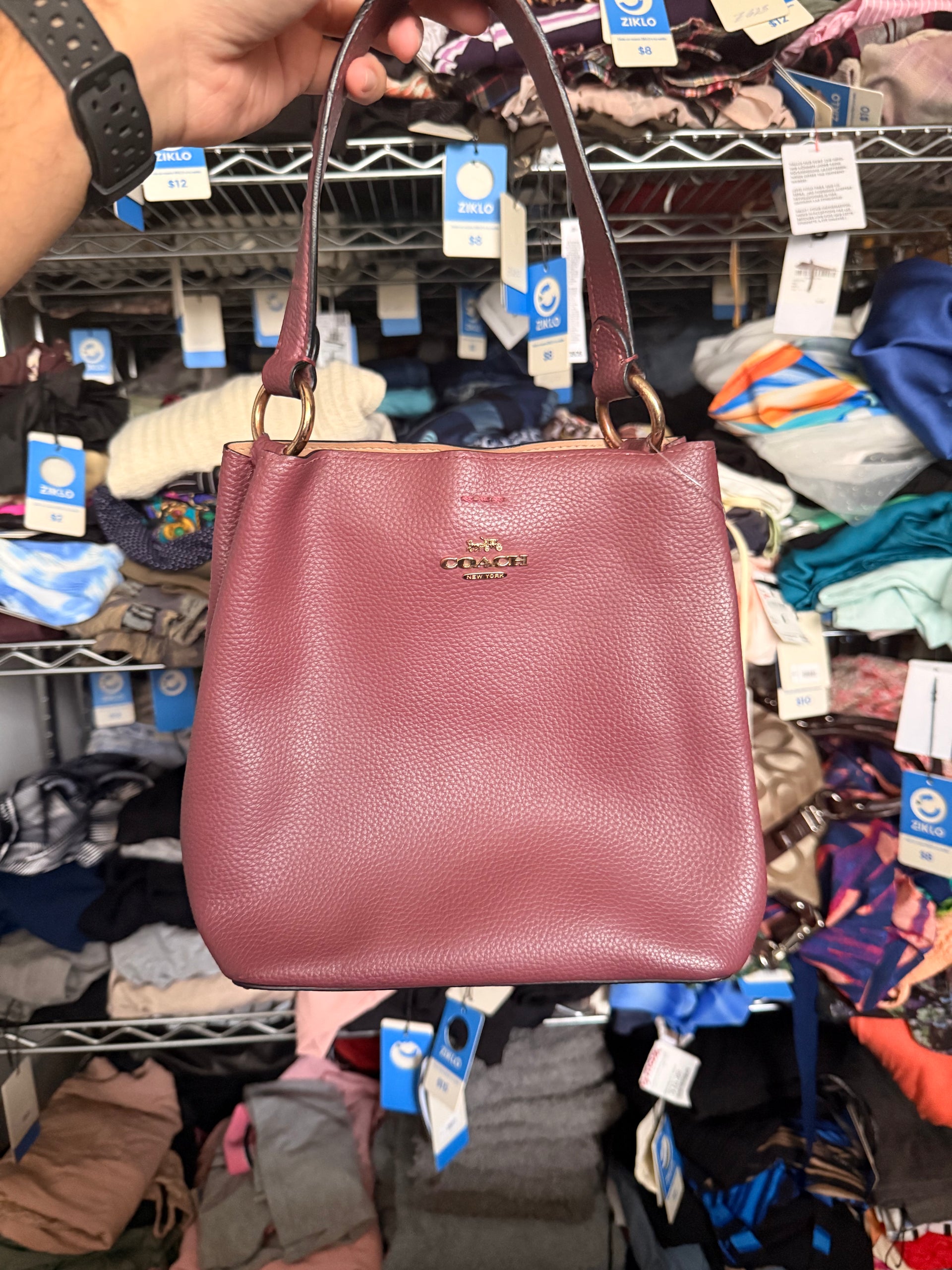 Cartera Coach